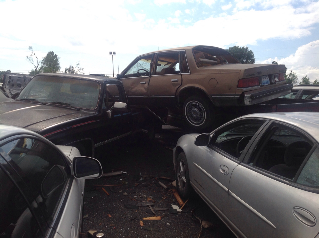 Photo of vehicles thrown around at car dealership on north edge of Mayfield