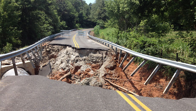 Photo of washed out road where fatality occurred