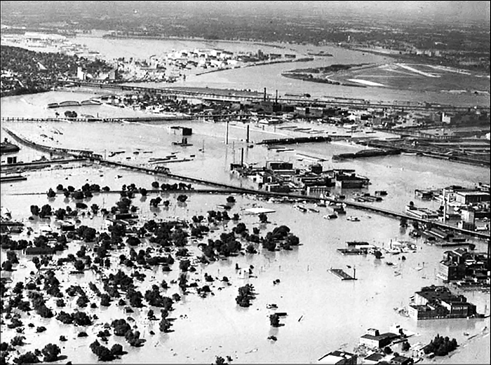 Aerial view of flooding at the confluence of the Kansas and Missouri Rivers in Kansas City looking northeast on July 13, 1951, photo courtesy of Warner Studio, Kansas City, Missouri