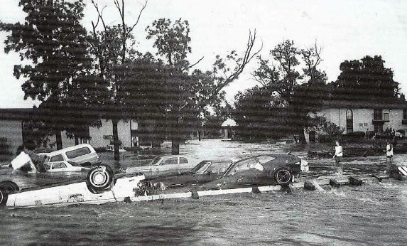 Flooding on the Arkansas River at Tulsa, OK, near 41st Street on May 21, 1957. Note the floodwaters over low levee on west side of the Arkansas River near Garden City. (From USWB Technical Paper No. 3, p. 65.)