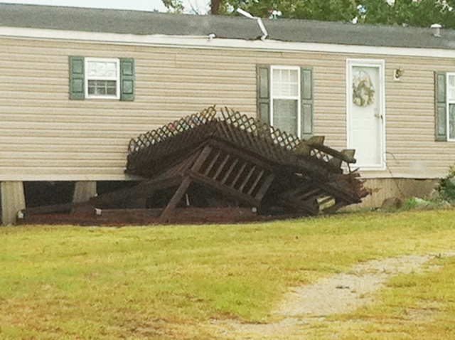 Front porch damaged by the storm