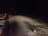 Sleet and freezing rain accumulates on a roadway in Dothan, AL, bringing down a power line. Photo courtesy of WTVY's Nate Harrington via their Twitter feed.