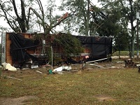 A mobile home toppled by an EF0 tornado that hit near Grand Ridge in Jackson County, FL on November 17, 2014.