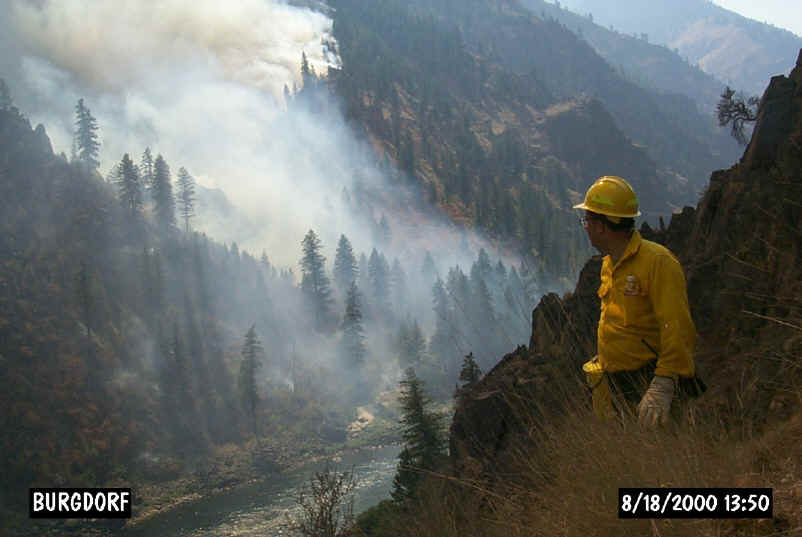A photo of IMET Mike Edmonston at the site of the Burgdorf Junction wildfire that occurred in Idaho in August 2000.