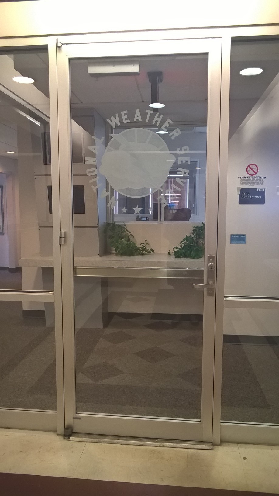 Webmaster, mark Wool, greeting you at the entrance to the offices of the Tallahassee National Weather Service.