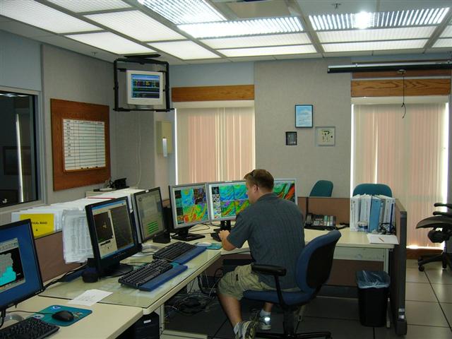 Forecaster Bryan Mroczka, working at the public desk.