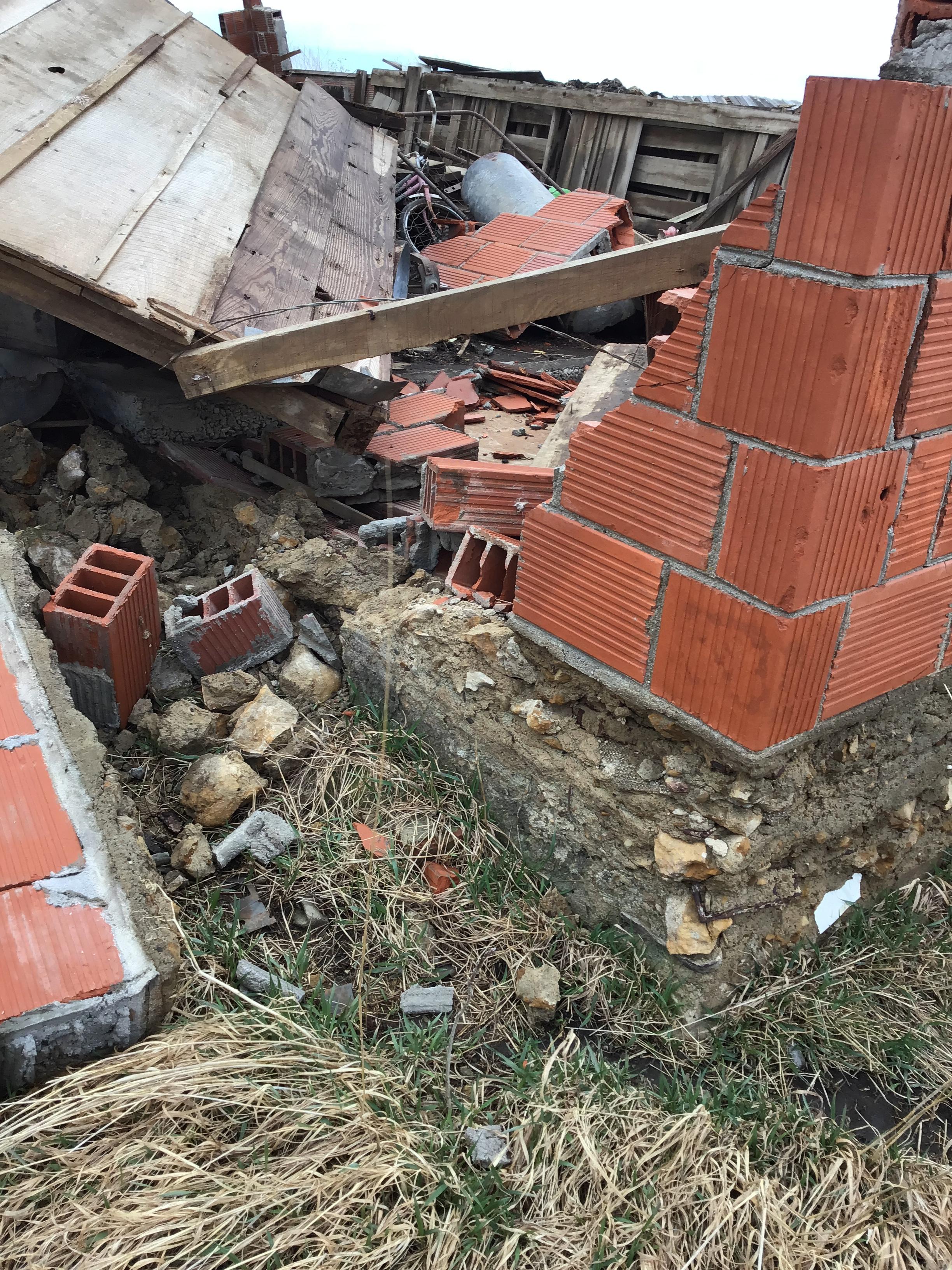 Wall of a brick building collapsed