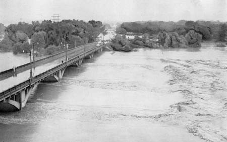 Floodwater under the Lawrence bridge