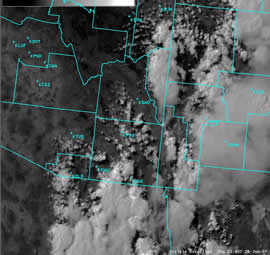 Visible satellite image of isolated thunderstorms during monsoon ramp-up, June 28, 2007