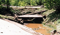 Bridge damage in Cleghorn Canyon, June 1997.