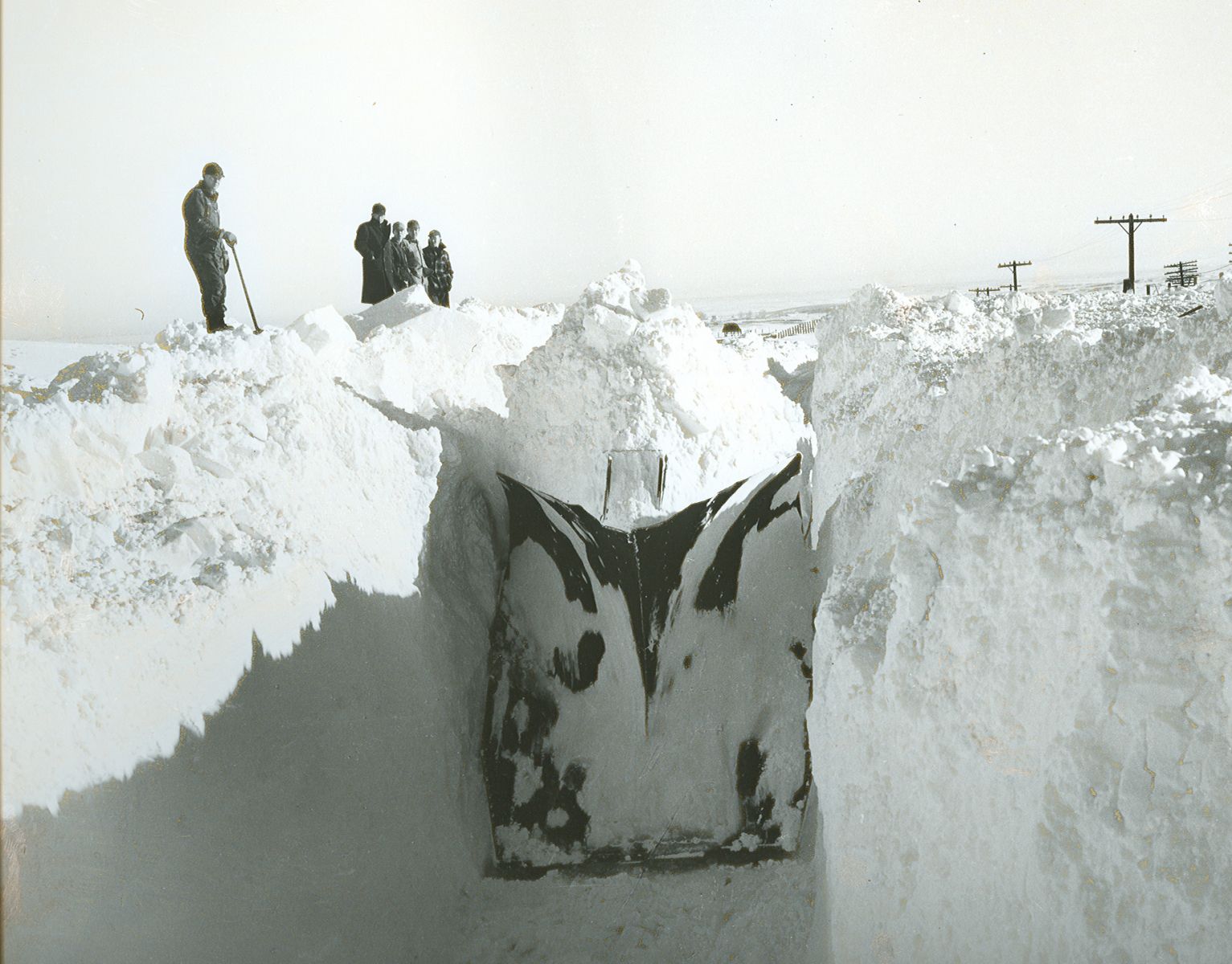 The railroad plow which bored through on the North Western line from Pierre east of Rapid City after dynamite as used to loosen ice-encrusted snow. Photo courtesy of the Rapid City Journal.