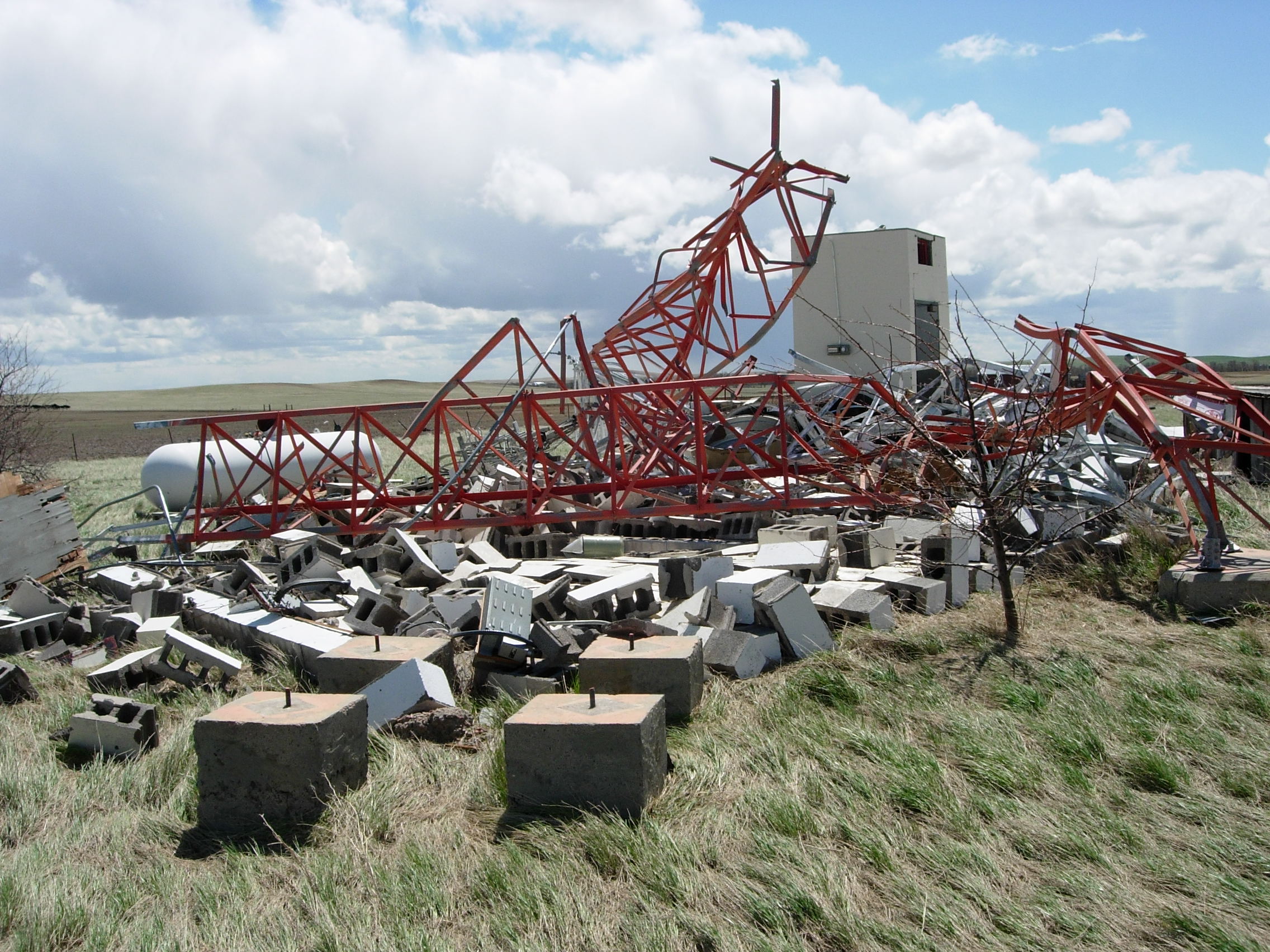 A microwave tower toppled by the winds