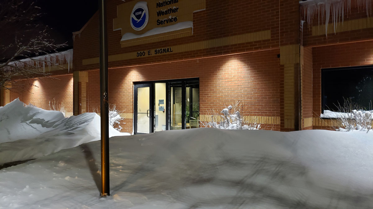 Snow drifts in front of the NWS Rapid City Office