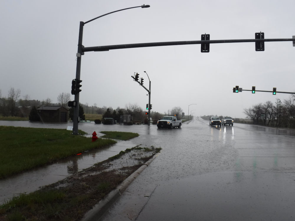 Flooded intersection with stoplights